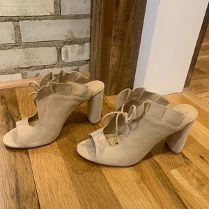 Comfy nude suede like heel.